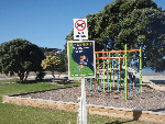 Dog sign at playground-213